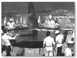 1980 - La festa  iniziata, ma non per i 65 quintali di pesce da cuocere sui 350 bruciatori a gas.