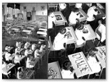 1935 - Aule. Si impara a scrivere DUCE con i cubetti